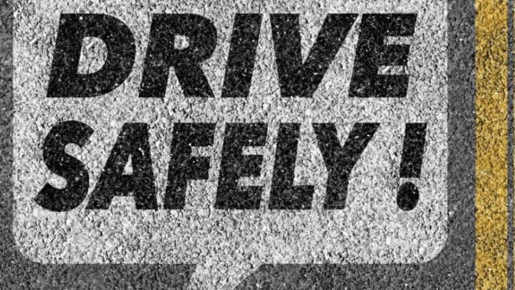 Building a Culture around Compliance, Safety and Accountability (CSA) Text that says "drive safely" in an asphalt design