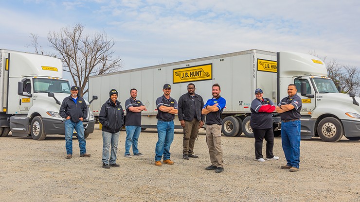 Driver Appreciation Blog Photo of truck drivers standing in front of J.B. Hunt truck