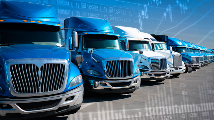 Dedicated Contract Services - Capital Allocation Blog truck fleet lined up dedicated contract services