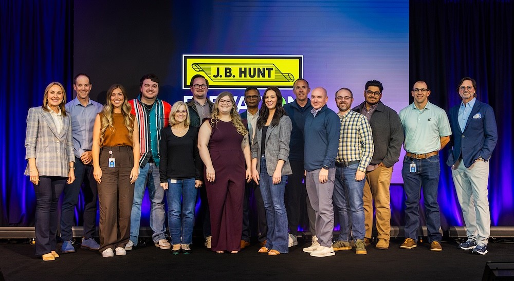 a group of employees are recognized for their elevation ideas