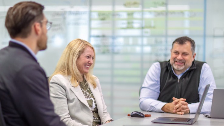 j.b. hunt employees meeting in a conference room j.b. hunt employees meeting in a conference room