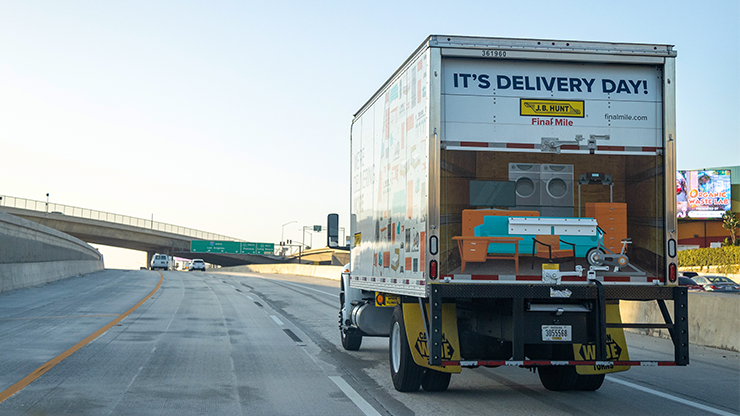 FMS Delivery Truck on Highway final mile services truck on the highway