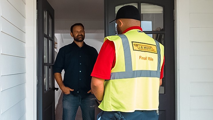 Final Mile Delivery employee meets customer at front door