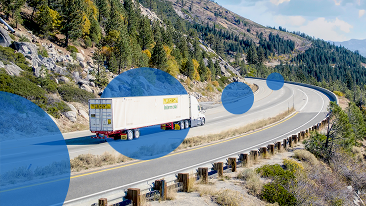 image of J.B. Hunt intermodal truck on mountain highway