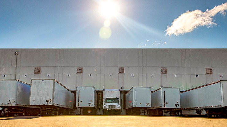 milgard warehouse with trucks parked in loading bays