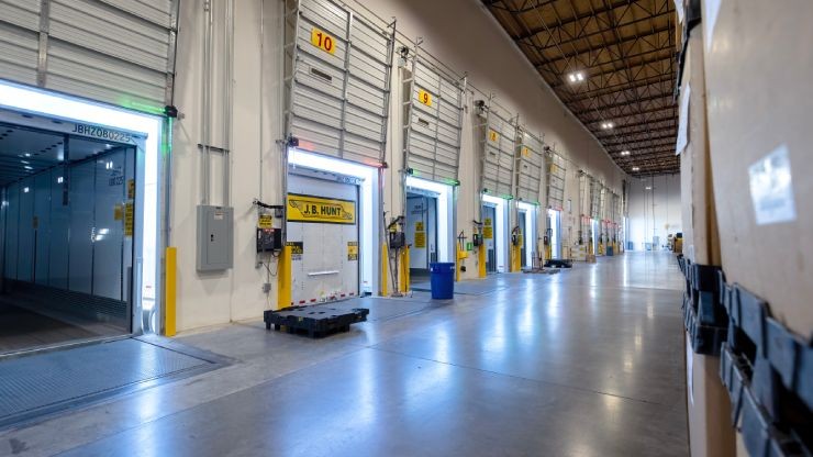 dedicated contract services trucks unloading at goodwill facility