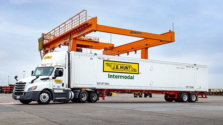 intermodal tractor trailer parked at an international loading dock