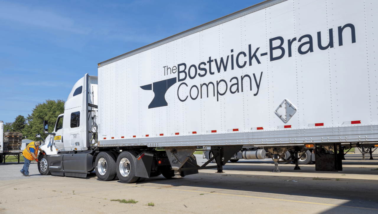 A Bostwick-Braun Company J.B. Hunt DCS truck is parked in a parking lot