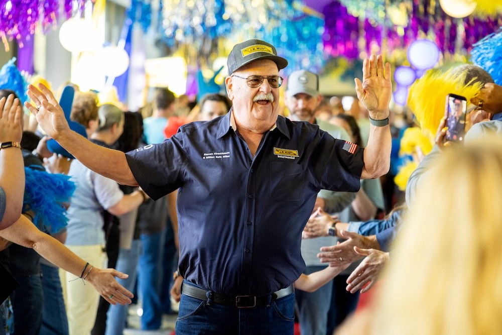 J.B. Hunt Intermodal driver Steve Kirschbaum celebrates 5 million miles without a DOT-reportable preventable accident at J.B. Hunt's annual Million Mile Walk of Fame at company headquarters on April 29.