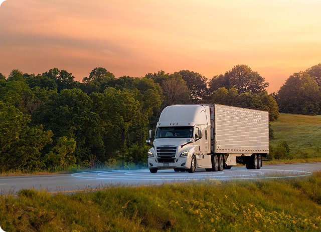 truck driving down highway with 3d render tracking graphic around it.