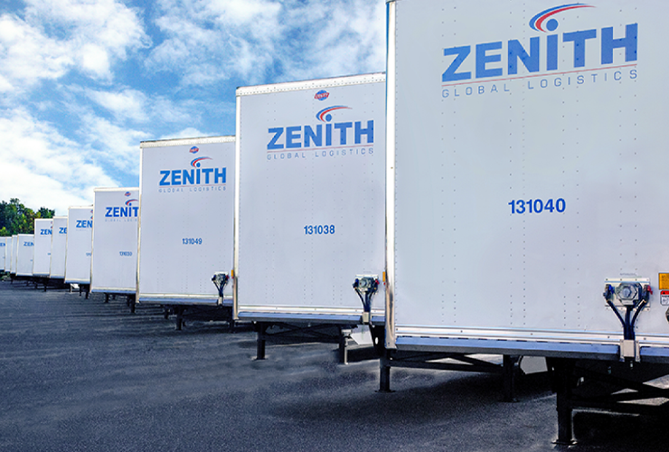 J.B. Hunt Zenith Trailers parked in a row on a sunny day