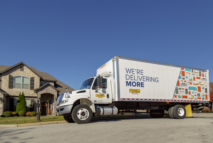 Final Mile straight truck parked in front of a house