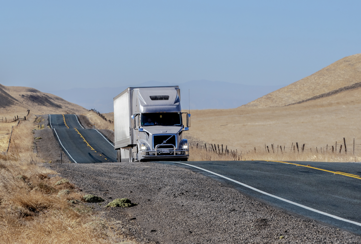 tractor trailer on two lane highway